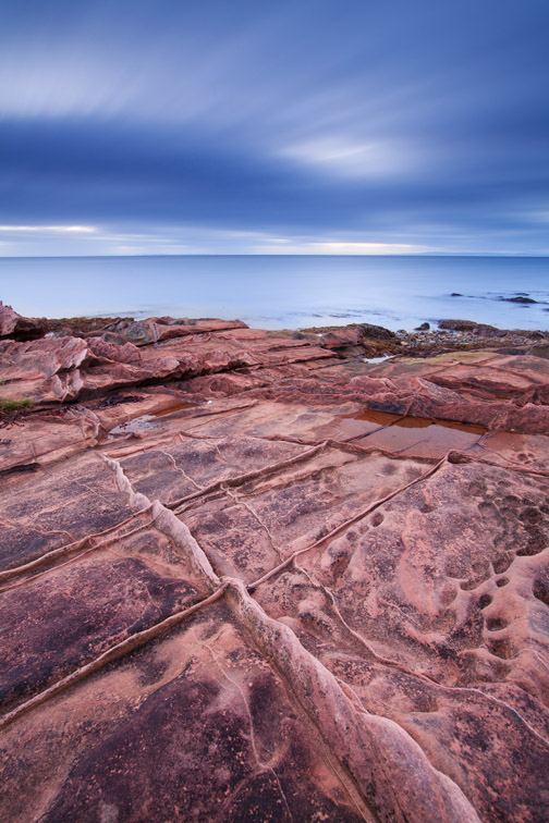Sandstone rocks and sea view, Isle fo Arran, Scotland, UK